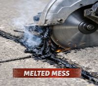 Melted Joint Sealant Material - Using a traditional blade.