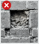 Damage to adjacent brick