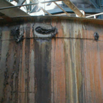 Clean corrosion from tank liners.