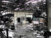 Aftermath of a combustible dust explosion at an acoustical tile plant.